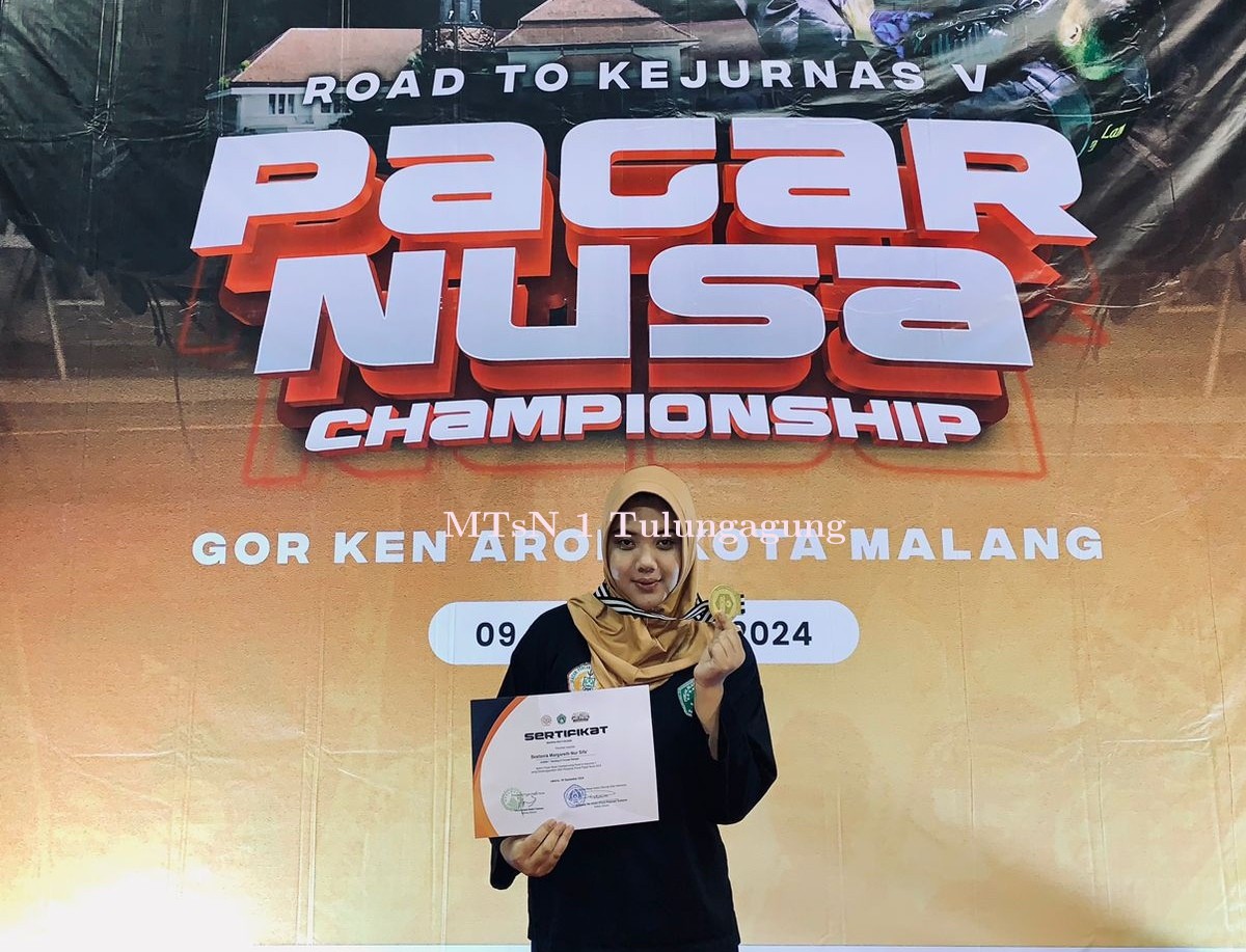 Juara I Pencak Silat Road to Kejurnas V Pagar Nusa Championship di Malang